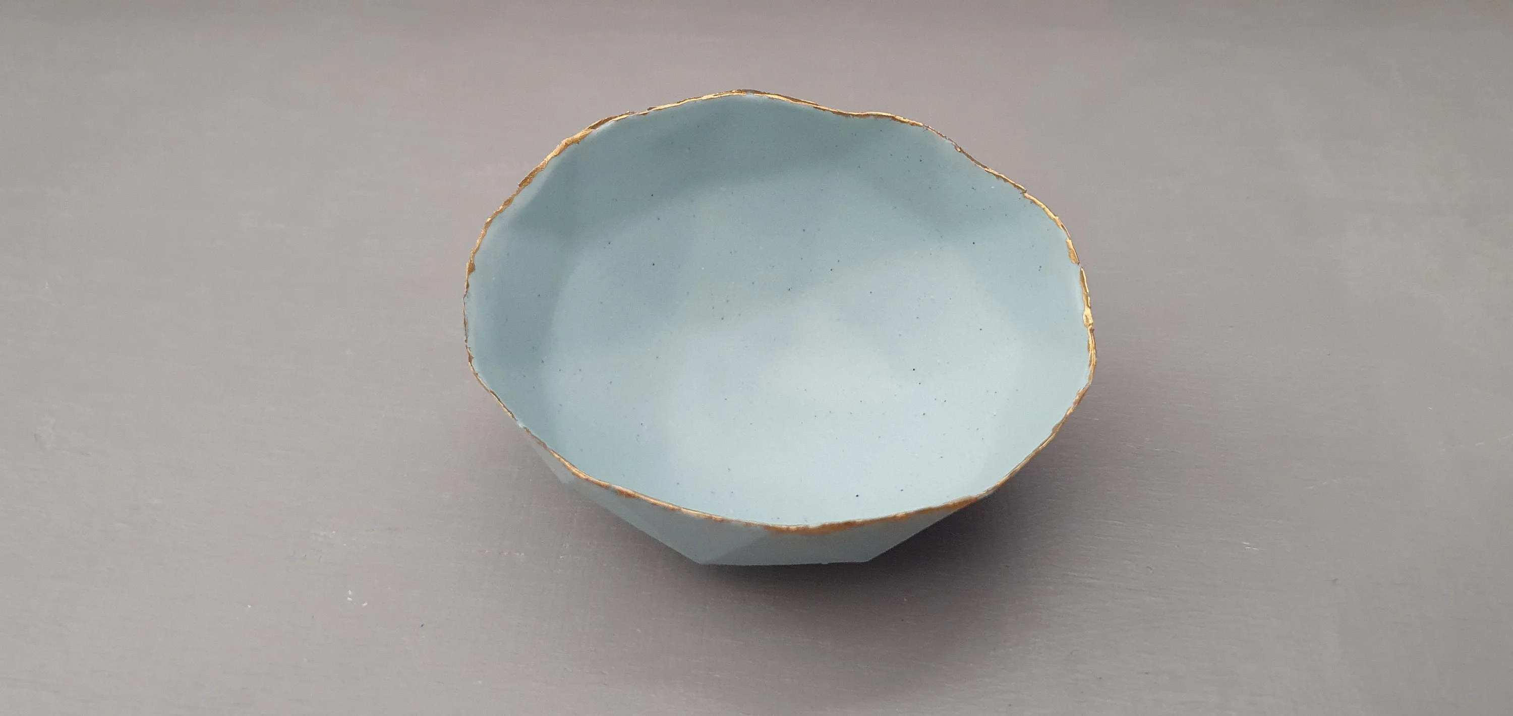 Geometric faceted polyhedron bowl in duck egg blue made from stoneware Parian porcelain with real gold finish -  geometric decor