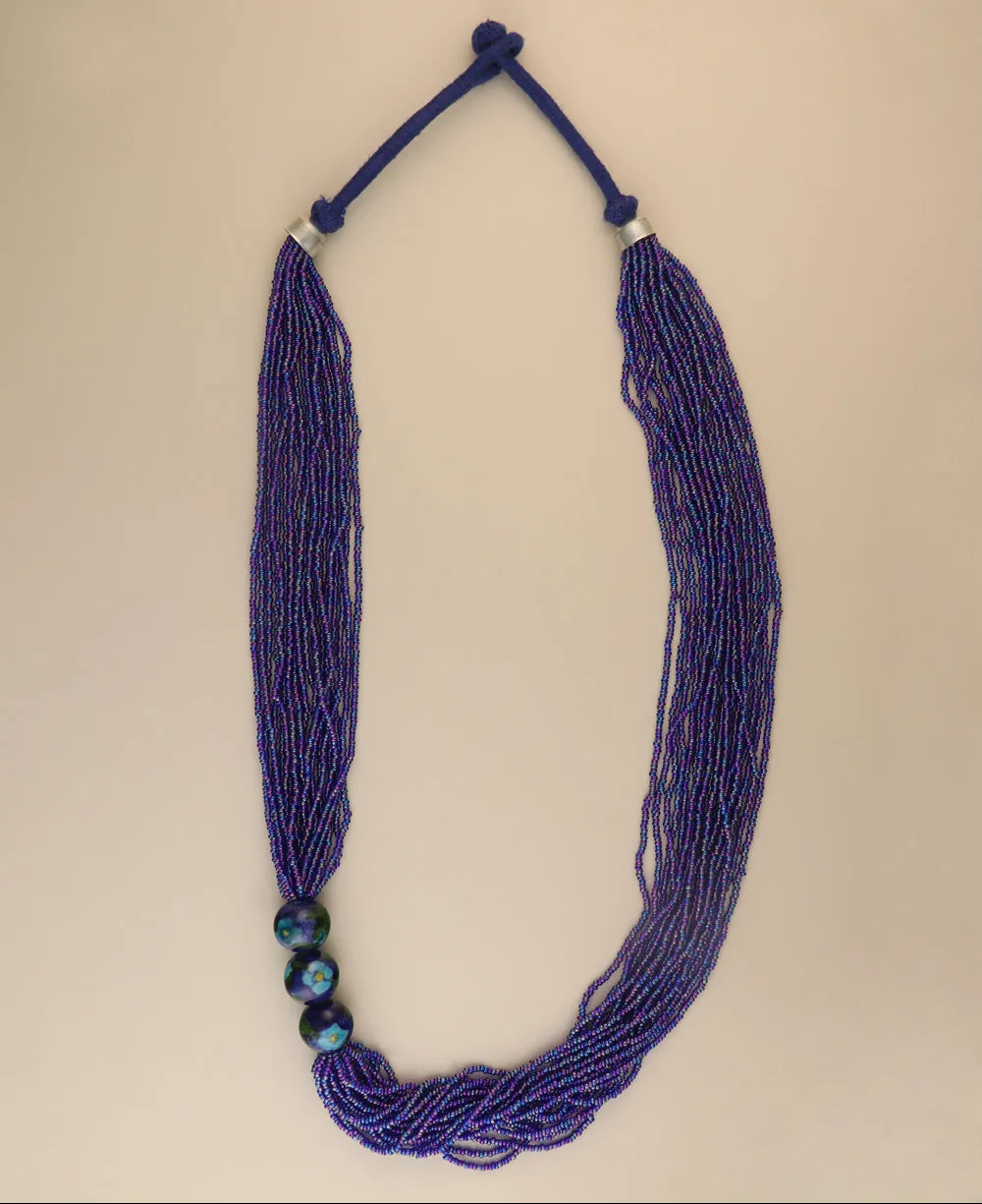 Multi-Strand Blue Glass Bead Necklace with Hand-Painted Ceramic Accents