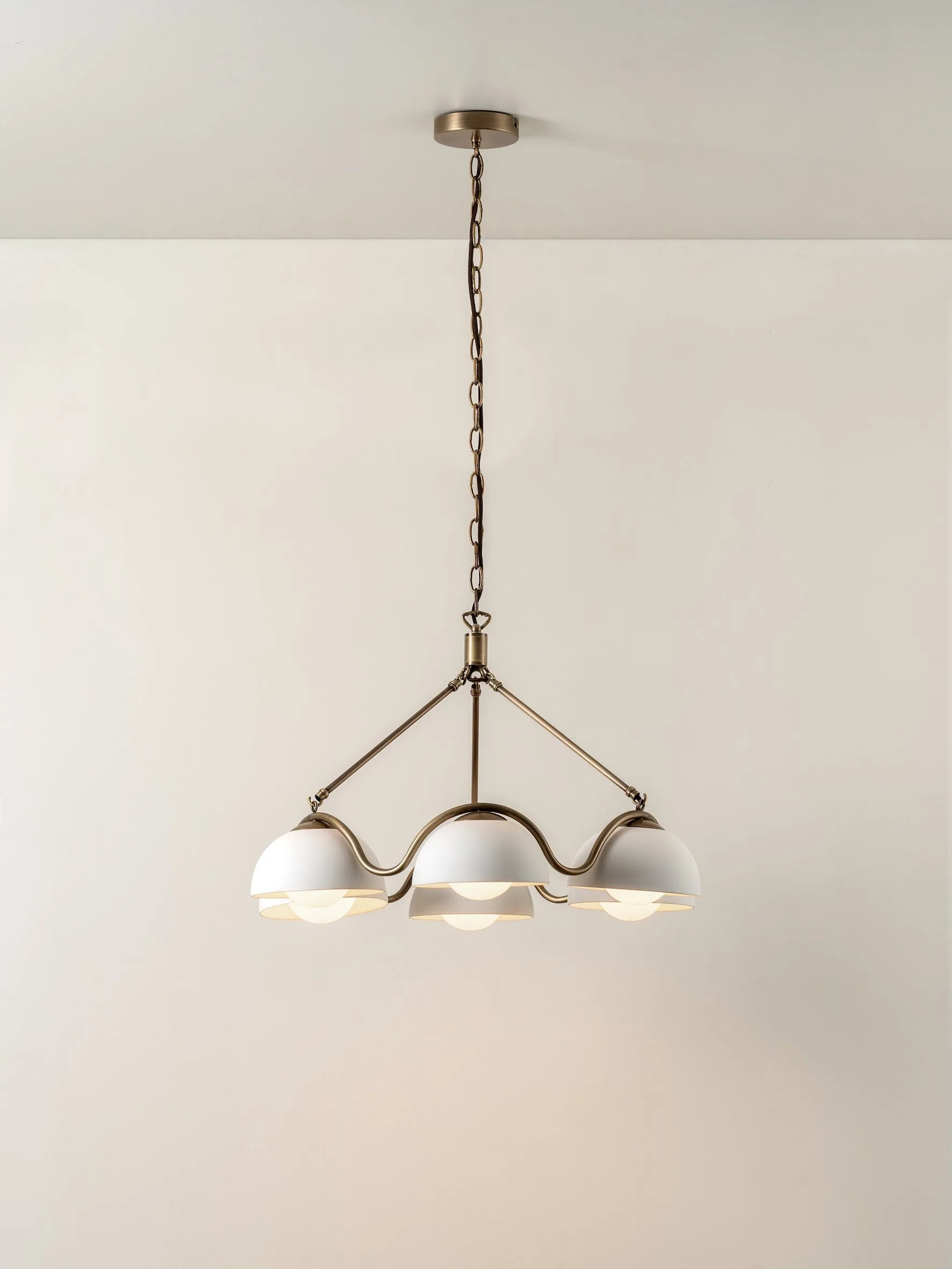 Waverly - 6 light aged brass and white porcelain pendant